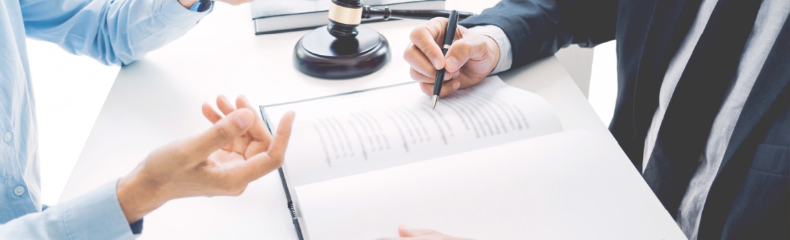 Injured worker filing workers compensation claim form.
