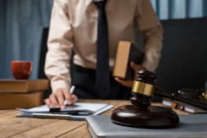A Charlottesville social security disability lawyer works on a case in his office.