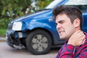 a man suffering from whiplash after a car accident in Virginia