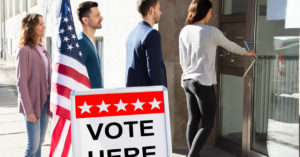 Group of young people lining up to vote.