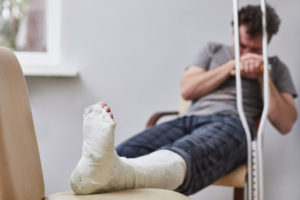 Injured man with broken leg