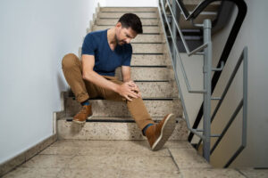 Knee pain from falling in the staircase.
