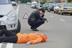 Lady pedestrian unconscious got hit by a car.