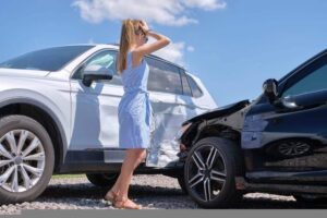 Lady driver worried in t-bone accident.