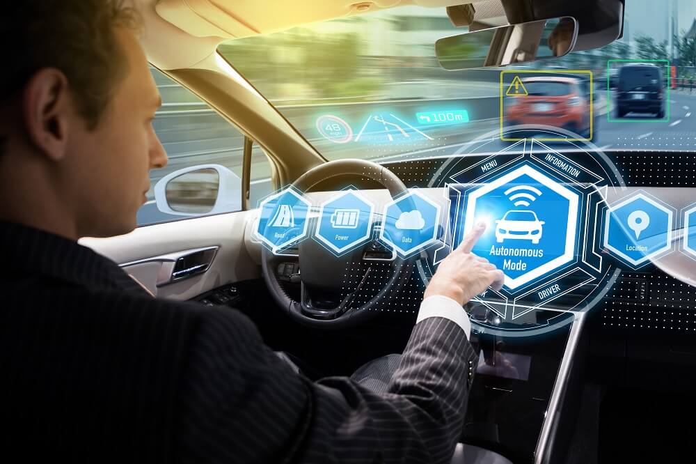 Driver activating self-driving mode.