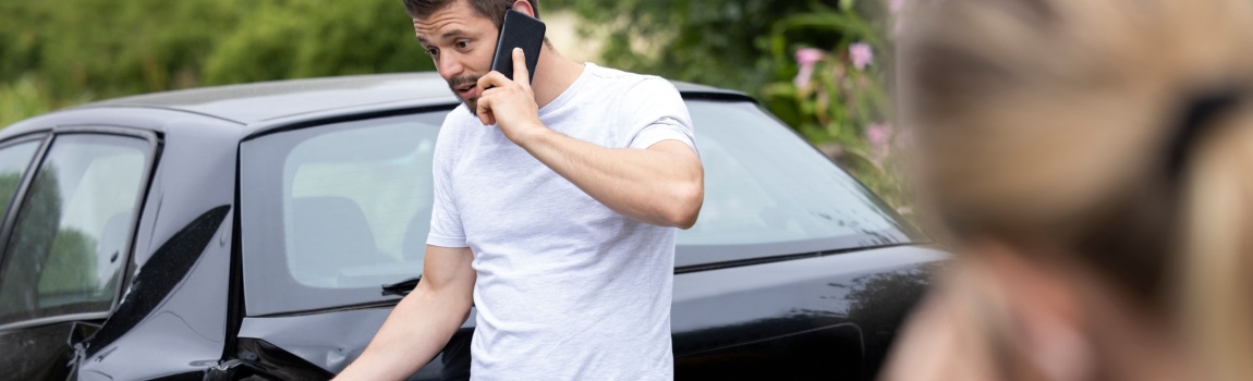 Driver calls insurance to report accident.