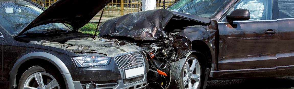 Head-on collision happening along the city highway.